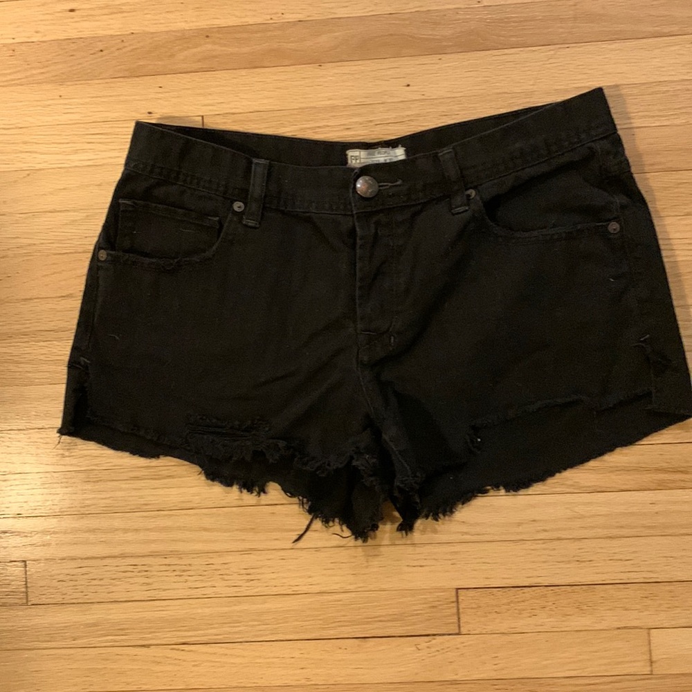 Black denim Free People shorts. Size 30.